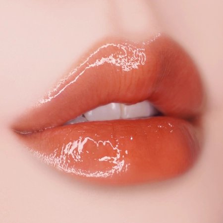 Unleashia - Sisua Popcorn Syrup Lip Plumper - Nawilżający Błyszczyk do Ust - No.4 Honey Grapefruit - 3,8g